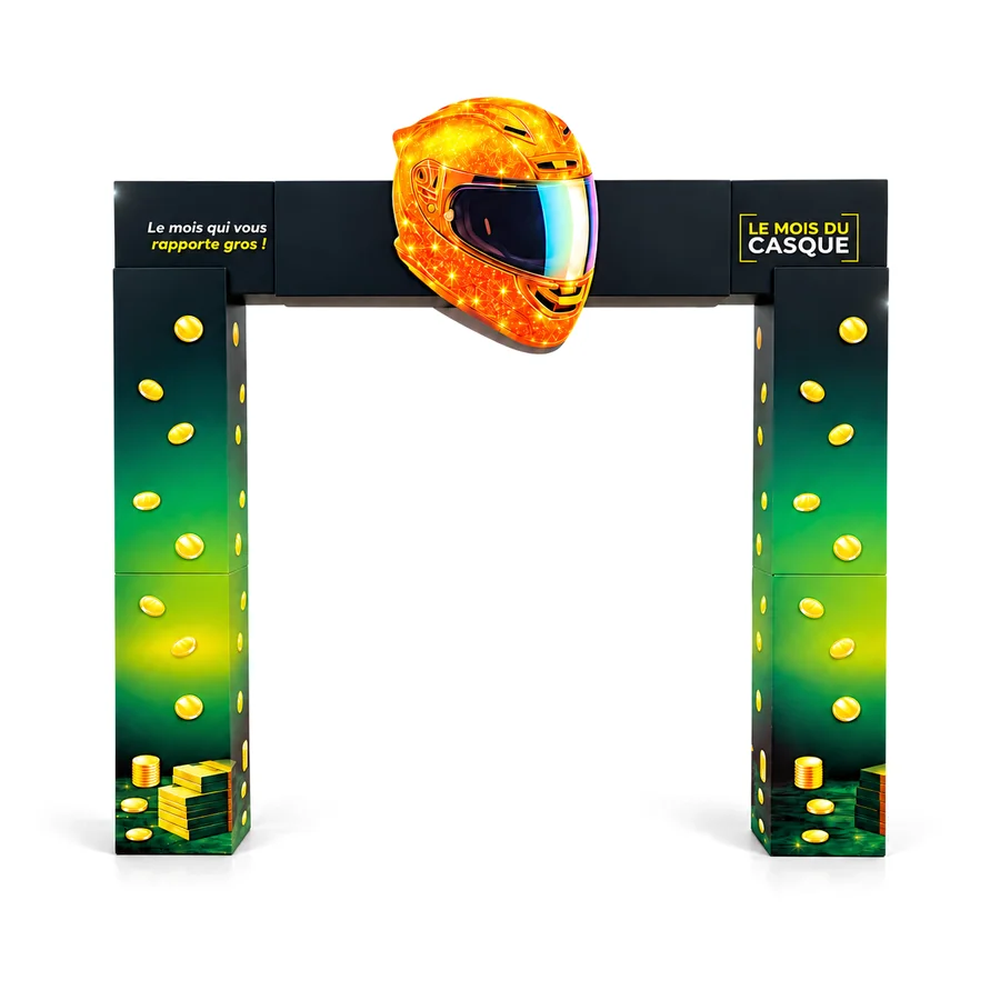 Arche Le Mois du Casque vue de face : deux piliers à dégradé vert et pièces d'or, bandeau et casque découpé